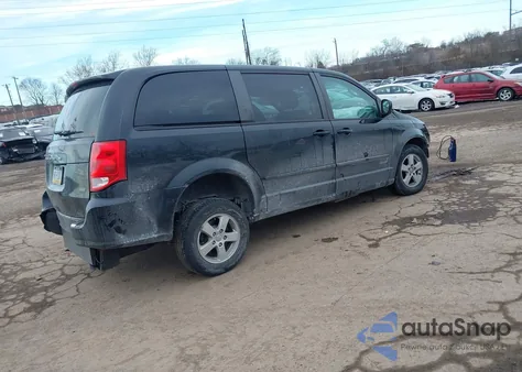2013 Dodge Grand Caravan Sxt z USA, uszkodzony, nr VIN 2C4RDGCG2DR521097